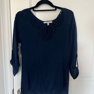 Elegant Navy Blouse with Embroidered Neckline​